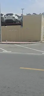 Built Yard for Sale in Al Sajaa – Prime Location with Existing Rental Income