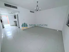 Large Studio in Al Khan Tower with Free Gym Spacious Layout Prime Location Close to Services Annual