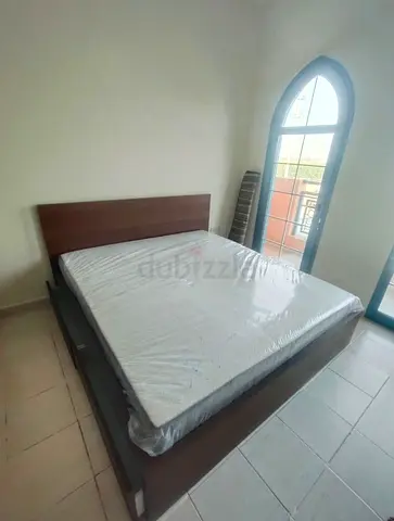 Ikea brown malm king bed with ikea mattress