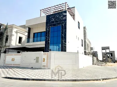 Corner Villa| ajman|al helio2|7 master rooms, majlis, hall, roof|freehold|price includes registration fees and central A\C|negotiable.