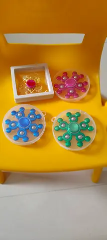 Set of 4 Small Spinning Fidget spinners - Pink, Blue, Green + gold
