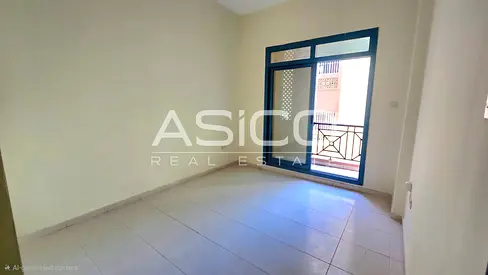 Spacious 1BR | Balcony | Al Muraqabat