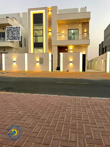 Modern 4BR villa with a roof terrace, including registration fees, in Al Bahia, Ajman. freehold bank financing .