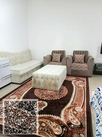 Studio apartment for sale in Al Hawaizone Towers, Ajman, with a balcony, large area, and parking.