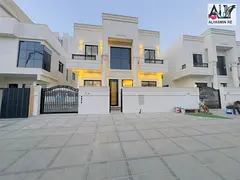 Luxury classic villa for sale in Al Helio area - Ajman, including registration fees, ownership, and