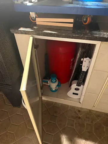 Refillable Gas Cylinder (Full Size) in Kitchen Cabinet - Good Condition