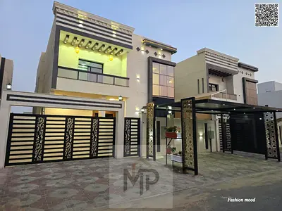 Villa for sale | ajman| al bahia area | 5 master rooms, majlis, hall, maid room| freehold | the price included water, electricity, and central A\C.