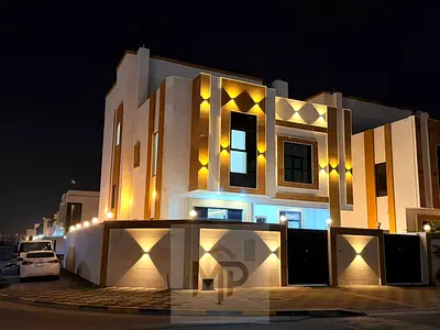 Corner villa for sale in Ajman | Al Zahiyah area | 7 bedrooms, majlis, 3 living rooms, maid's room, and roof terrace | Freehold for all nationalities