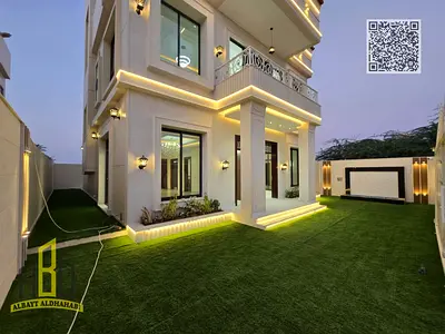 Luxury villa for rent, first occupancy, on a main road next to Al Safir Market and all services.