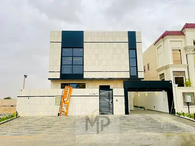 Luxury Villa for Sale in Al Bahia – Ajman | 6 Master Bedrooms + Majlis + 3 Living Rooms + Maid's Room | With a Rooftop with a Stunning View