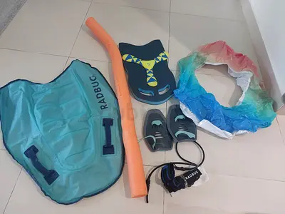 Swim training kit — kickboard, fins, float belt, noodles  paddles