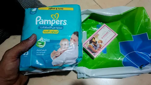 1 bag Pampers with 1 stick Baby Diapers