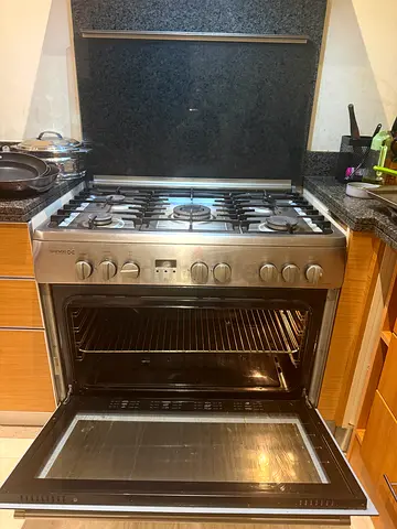 Daewoo Stainless Steel Gas Range with Oven - Good Working Condition