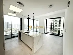 Island Kitchen | Spacious Layout | Pool View