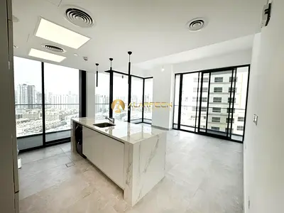 Island Kitchen | Spacious Layout | Pool View