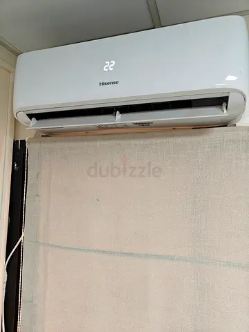Split ac unit 1 ton Hisense perfect condition, used barely in deira
