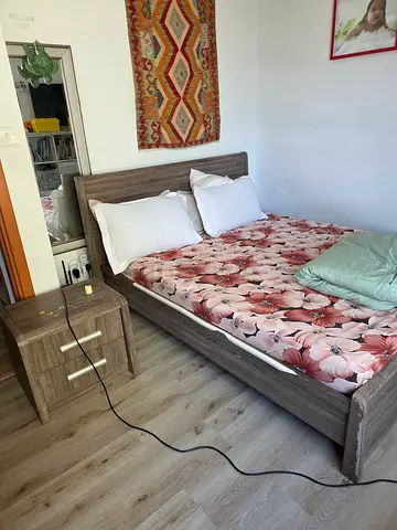 Queen-size wooden bed frame with nightstand - good condition