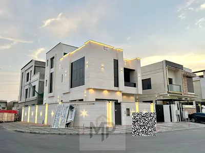 A distinctive villa in Al Yasmin area - Ajman, two floors + roof, strategic corner location, including water, electricity and air conditioning