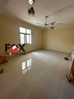 2BR hall for rent in Ajman, Al Nuaimiya 2. Well-known building on Kuwait St, prime location, close t