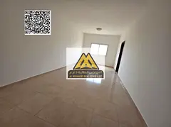 A very spacious studio for annual rent in Al Jurf – Ajman, featuring central air conditioning and 