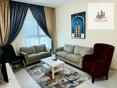 Sharjah, Al Taawun area: Two-bedroom apartment with a living room, kitchen, two bathrooms, and a bal