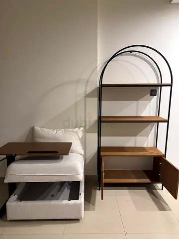 Modern wall-mounted shelving unit with ottoman (used)
