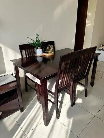 Black Dining Table with Comfortable Chairs