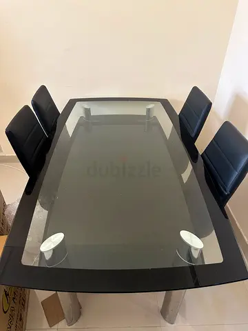 Glass Top Dining Table with 4 Black Chairs - Modern Design
