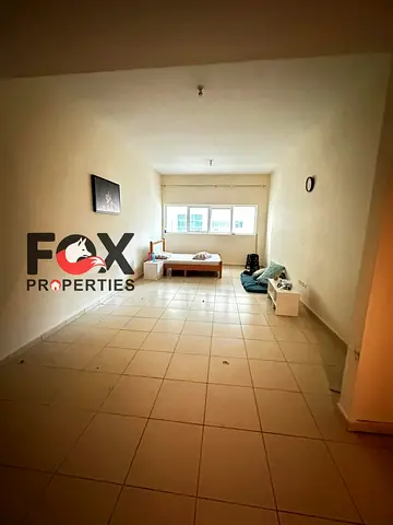 Studio for rent in Ajman One Towers Al Rashidiya 3 Ajman separate kitchen wardrobes free parking 4 payments security cheque