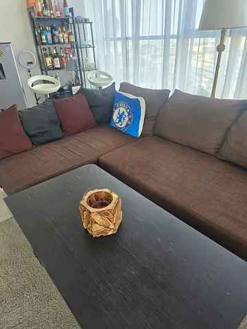 Brown sectional sofa in good condition - spacious 3-seater with chaise