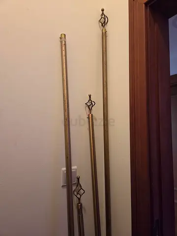 Set of 4 decorative metal curtain rods with finials - used