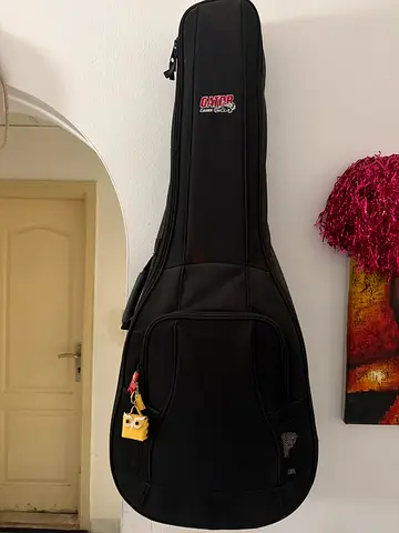 Used acoustic  guitar and extra string and Fender amp with connected cable- good condition