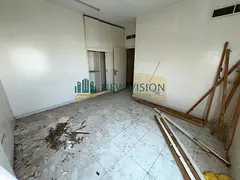 Two rooms and a living room, a clear bachelor contract, in the Abu Shagara area on Al Wahda Street.