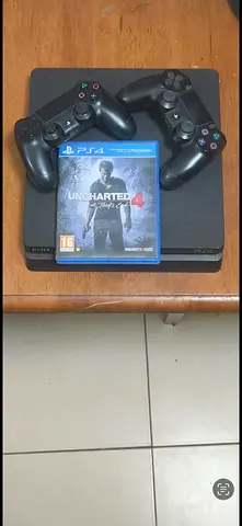 PS4 500 GB with 2 controllers and 3 games
