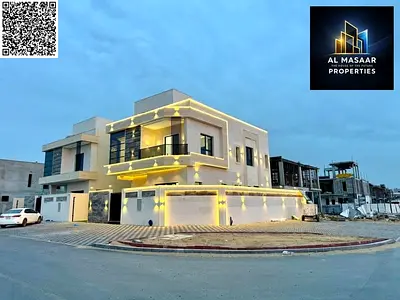 Villa (corner) for sale in Ajman | Al Helio 2 area | 5 rooms, majlis, 2 halls and roof | Freehold o