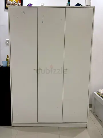 Simple white 3-door wardrobe / armoire — good storage, some wear