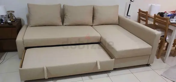 Ikea L Shape Sofa cum bed with big storage in L , and You can fix the L left and right any side