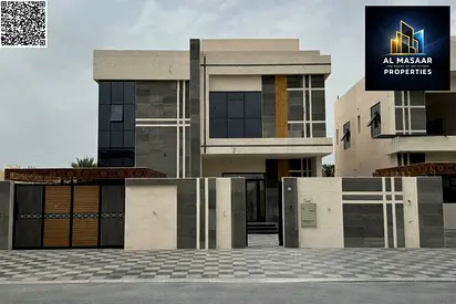 Villa for sale in Al Rawdah, two floors, roof, and external annex. Freehold ownership. Price includes air conditioning and is negotiable.