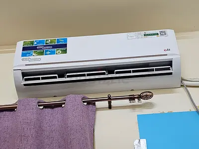Used wall-mounted split air conditioner (working) - 1.5 ton approx