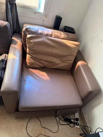 Compact single-seater recliner leather armchair in beige — good condition