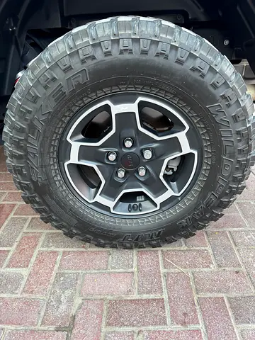 🚗 Used Falken Wildpeak M/T 285/70R17 Tire with Original Ring for Sale 🚗