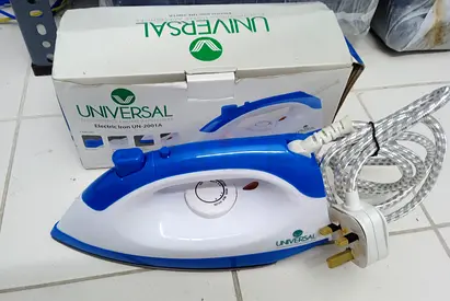 Universal Electric Steam Iron (blue/white) - Good working condition