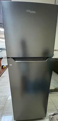 Silver double-door refrigerator - good working condition