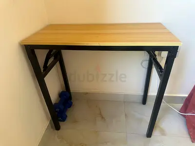 Compact foldable study table with wood top and metal legs