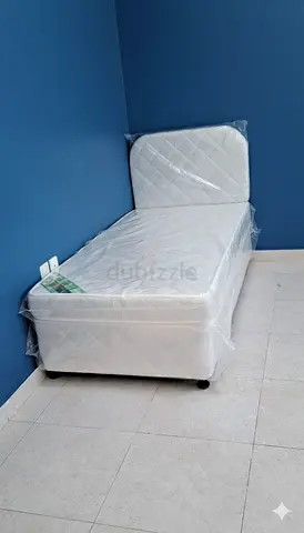 Single divan bed with mattress - like new, still wrapped