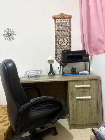 Compact wooden office desk with drawers  and swivel chair