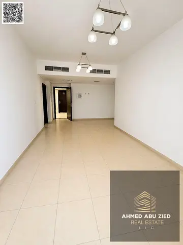 Largest stylish 1BR apartment, hall, gym, pool, free parking, 2 baths, balcony open view, central AC, spacious, prime location, easy access to Dubai &