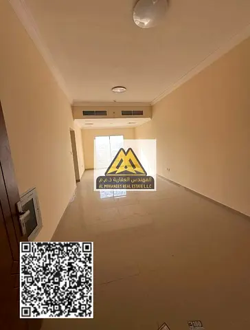 For annual rent: A spacious apartment with ample living space, brand new, in Al Jurf 3, Ajman. Located in a prime location near the Sheikh Mohammed Bi