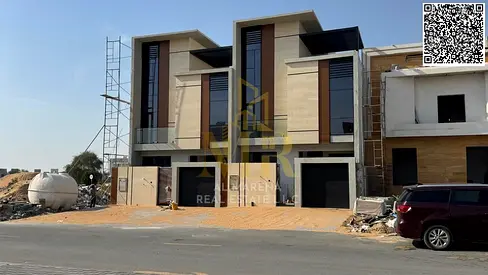 Spacious family villa in Al-Haliyo 2, elegant design, price includes electricity, water, and air conditioning.