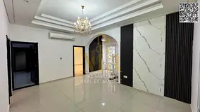 Two-story villa in Al Yasmin, 5 bedrooms, at a special price including electricity, water, and air c